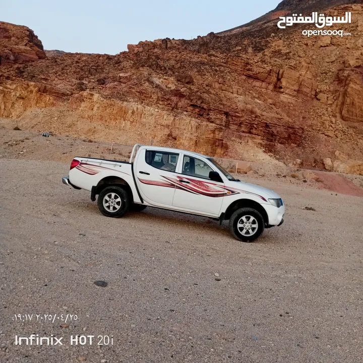 بك اب متسوبيشي   l200 موديل 2009 فور ويل 4X4