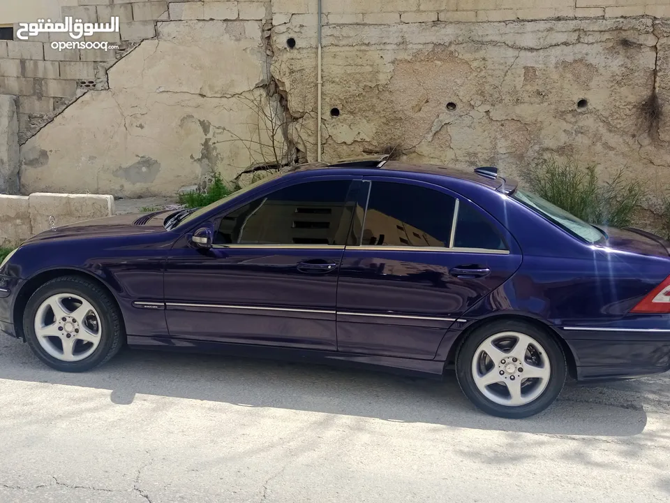مرسيدس c200/ افنجارد فل كامل وفحص كامل موديل 2001 ماتور 2000 احمر