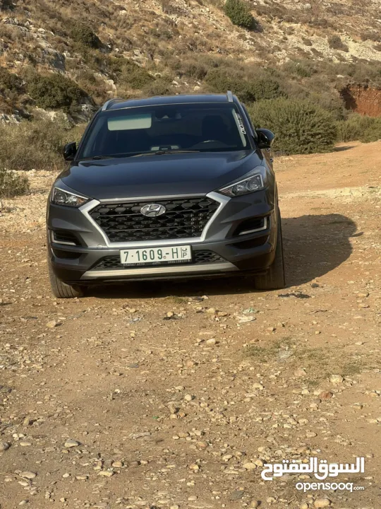 توسان 2020ترخيص19يد اولى فحص نخب لون مميز بصمة مع مفتاحين شركة بسعرر حرق