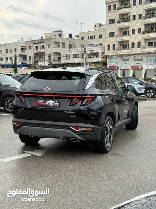 هونداي توسان ترخيص 2022 محرك 1600 هايبرد plug in/يقطع على الشحنه 65 كيلو متر جير أوتوماتيك