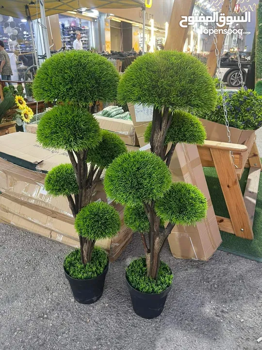 كل ما يلزم الحديقه عشب صناعي جميع انواع خشب سويد تفصيل شجر صناعي جلسات خشب سويدي اشجار تحاكي الطبيعة