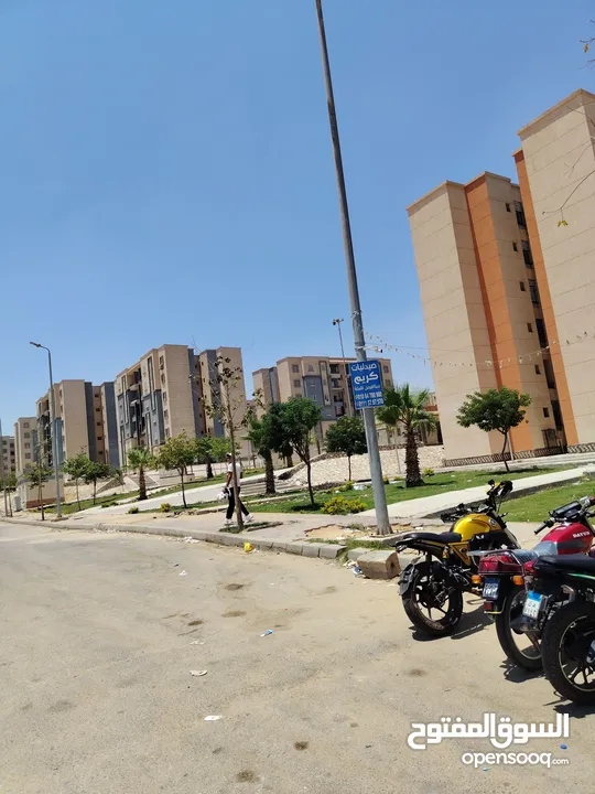 محل تجاري في منطقه 390 فدان في حداىق أكتوبر بجوار ابني بيتك السابعه و مشروع 557 عماره