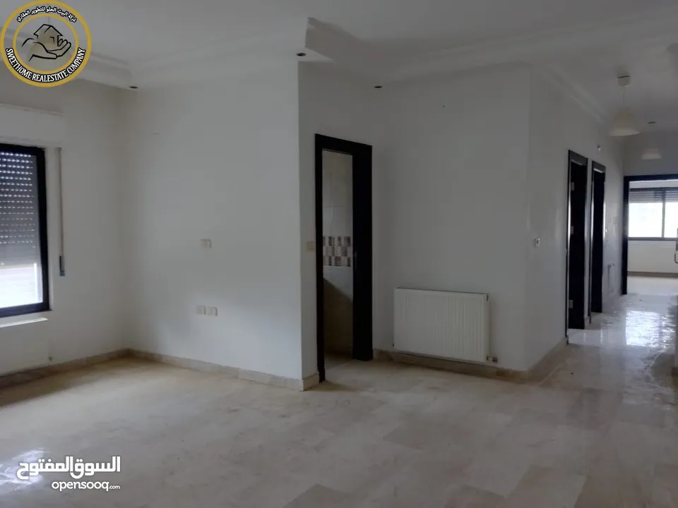 شقة أرضية مميزة للبيع في عبدون  - خلف تاج مول 90م تشطيب سوبر ديلوكس بسعر مغري