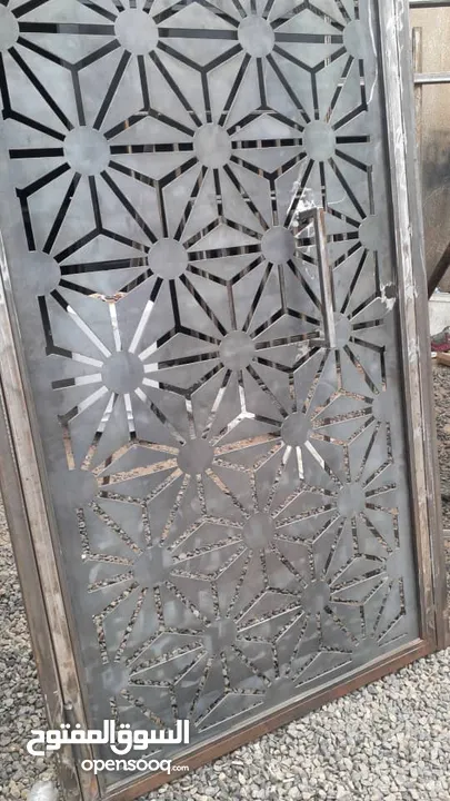 تصنيع وتركيب ابواب الليزر