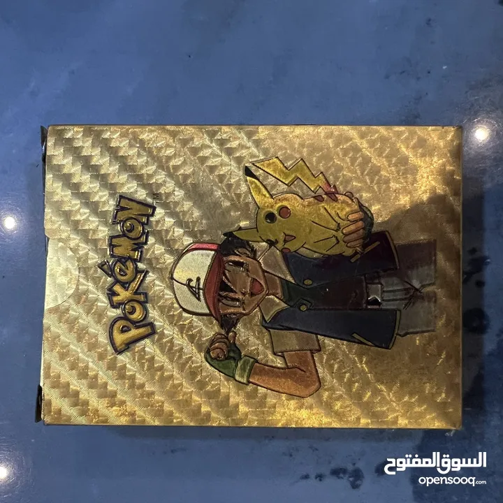 كروت بوكيمون والبومات (Pokemon cards and binders)