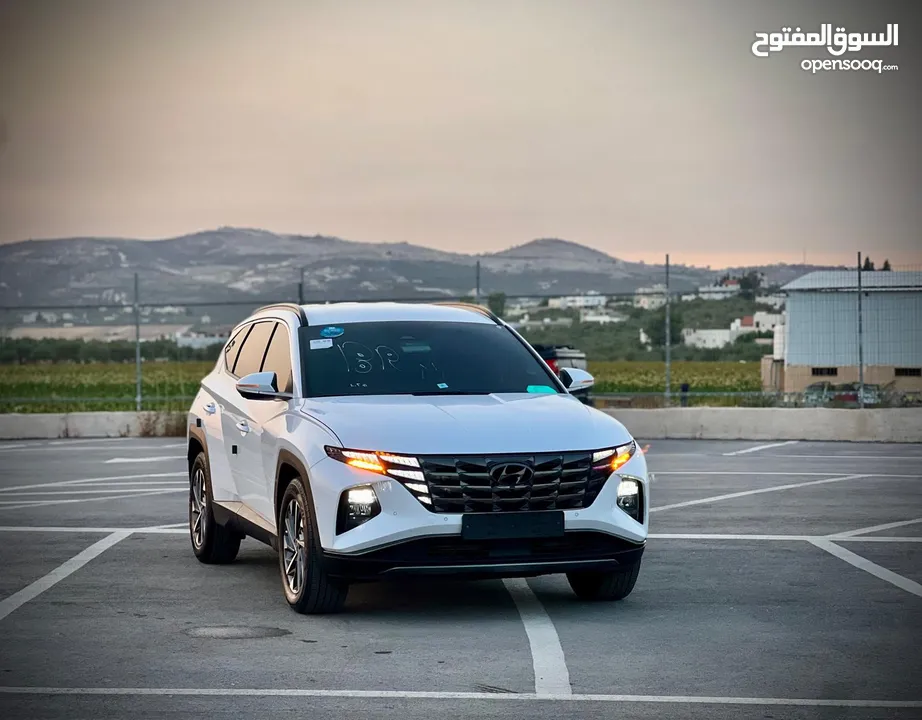 هونداي توسان /2022 فل الفل بدون فتحة سقف  2x4 ///240Hp بنزين + كهرباء  ( Haybrid) 1600cc