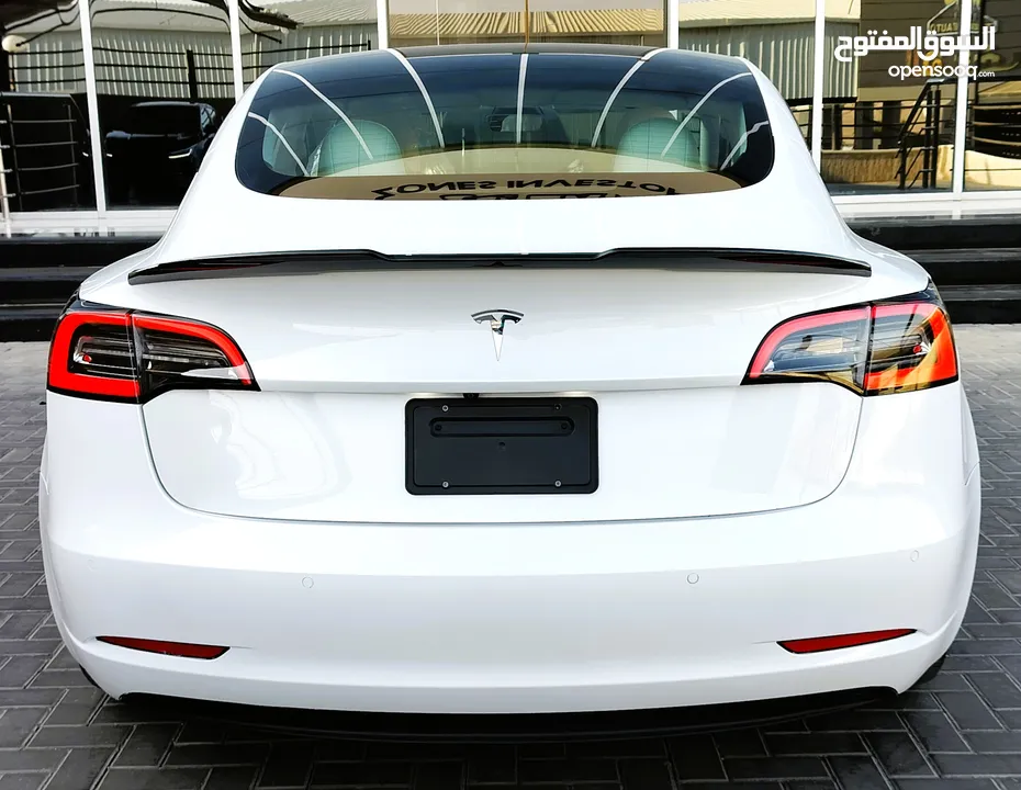 تيسلا 2021 model 3 فحص كامل 4 جـيـد فرش ابيض جنط 19بحالة الوكالة لون مميز للبيع بسعر لقطة ومحروووق