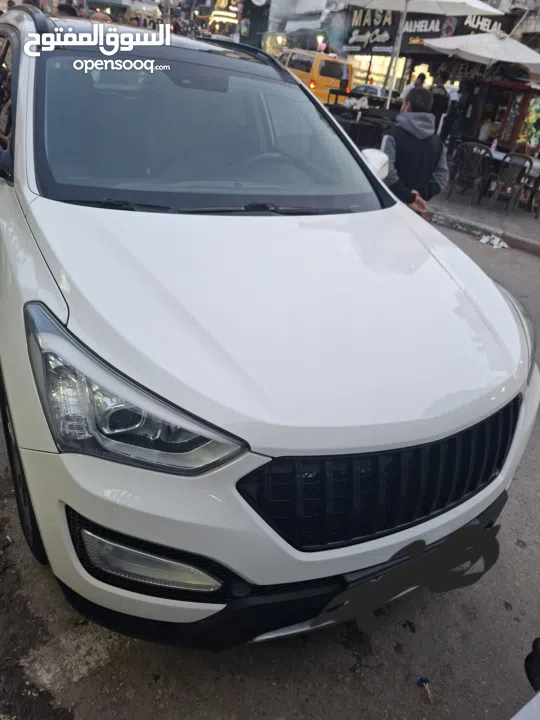 سانتافي 2014 لون ابيض 4*4 ماتور 2000 ديزلكاش 73000 ممكن دفعه لا تقل عن 40000 وشكات مع فرق بالسعر