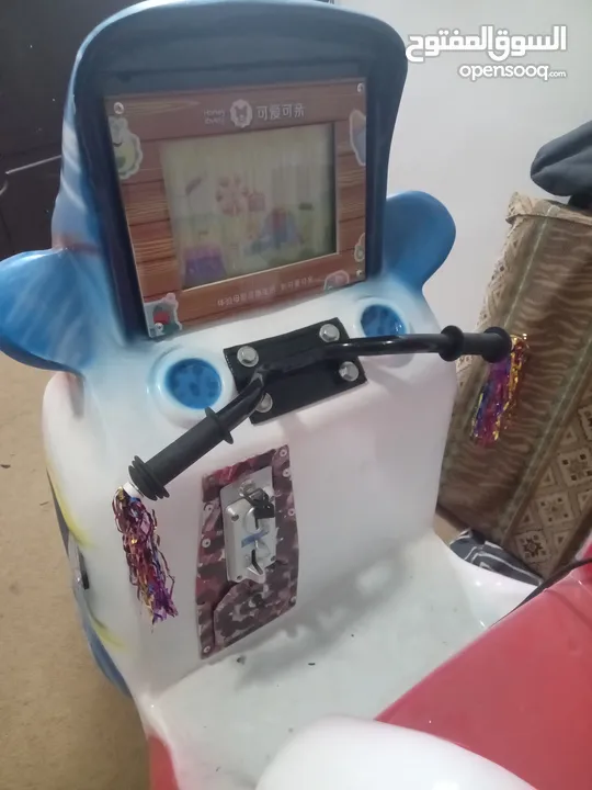 لعبه هزازة كهربائيه تعمل على العملة المعدنيه