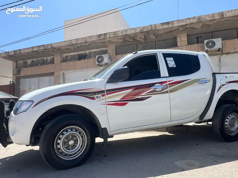 l200 موديل  2009 فحص كامل مالك ثاني من الحره ماشيه 226 الف
