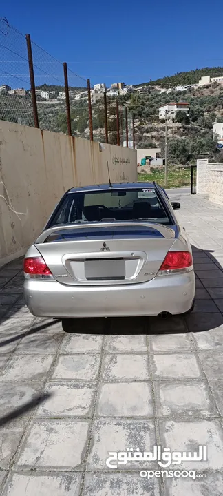 لانسر 2005 توب ترونيك 1600