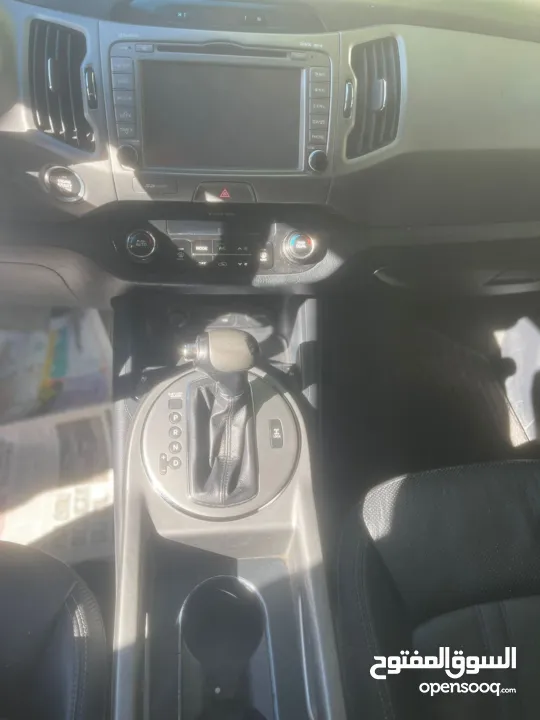 كيا سبورتاج فل الفل ما عدا فتحه ترخيص 2014  الجيب بوضع الشركة