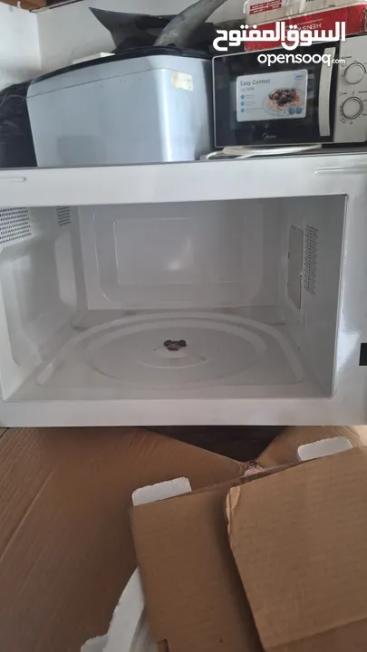 WAW 34L/43L Microwave Oven with Grill  1000W Power  Speedy Defrost & Child Lock  Model WAWM34EG