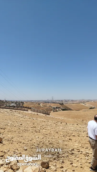 ارض تجاريه وسكينه مميزه، على راس جبل مطله اطلاله مميزه ، جريبا