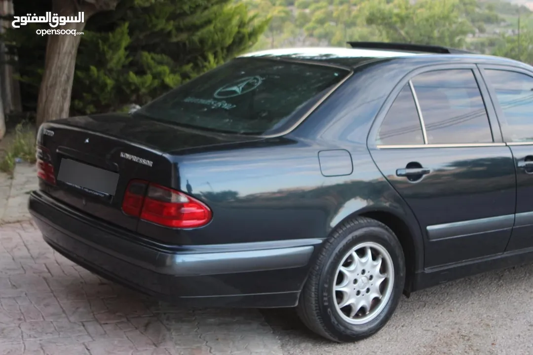 E200. 2002  قرش ونص 2002  رقم الهاتف بالوصف