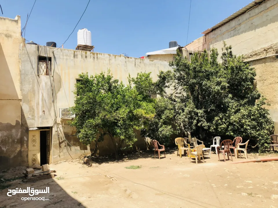 بيع محلات ومنزل