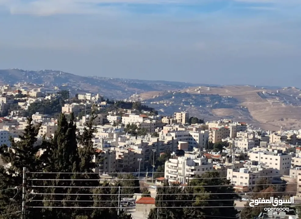 ارض للبيع في ضاحية الحمر مميزه لفيلا باطلاله خياليه