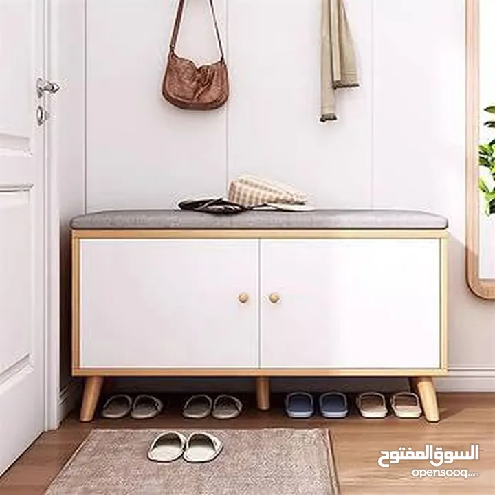 مقعد أحذية أنيق ومريح مكوّن من دفتين  قطعة عملية تجمع بين الجلوس المريح والتخزين الأنيق في نفس ا