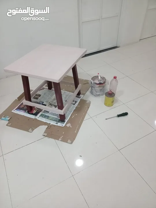 table and cabinet and teapoy