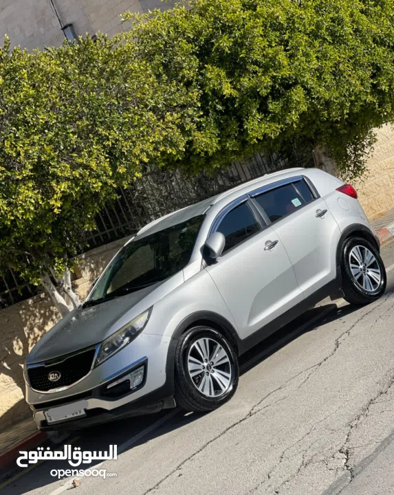 كيا سبورتاج فل الفل ما عدا فتحه ترخيص 2014  الجيب بوضع الشركة