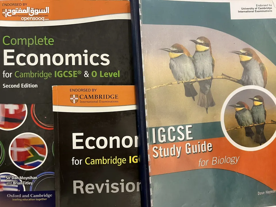 IGCSE ECONOMICS (+revision guide) + Biology IGCSE guide