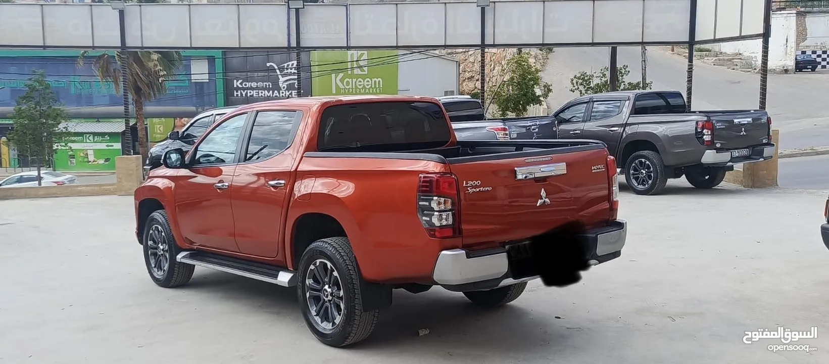 ميتسوبيشي سبيرتيرو L200 2021  فحص كامل (3/كاميرات) يمكن التمويل عن طريق المعرض بدفعه أولى 11000 الف