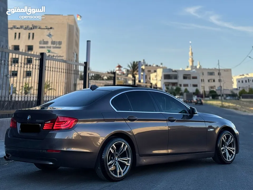 ‏‎سيارة BMW520i F10 لون نحاسي ميتالك فل الفل 2013 وارد الشركه تب نظافه