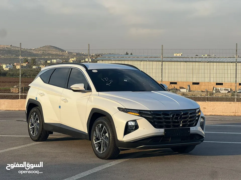 هونداي توسان /2022 فل الفل بدون فتحة سقف  2x4 ///240Hp بنزين + كهرباء  ( Haybrid) 1600cc