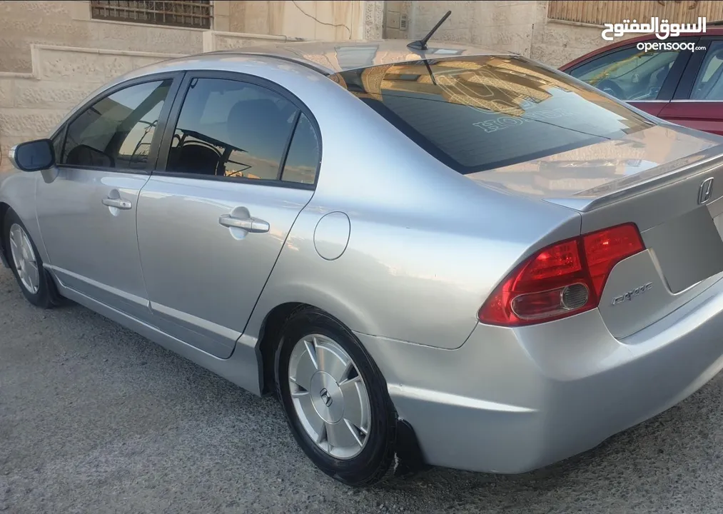 هوندا سيفيك هايبرد 2007 دهان وكالة جديد بتمشي 350 كيلو بالتنكة.