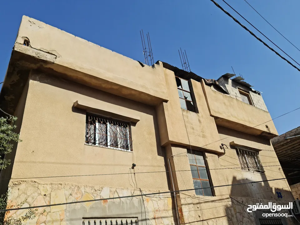 شقه للبيع  في منطقة عوجان /حي الظاهرية بمساحة 165 يحتاج بعض الترميمات
