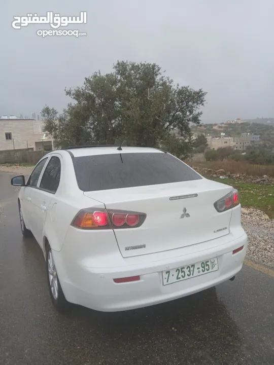 ميتسوبيشي لانسر. 2015 اصل برايفت رخصة وتامين ماطور 1600 اتومات شامل فتحة