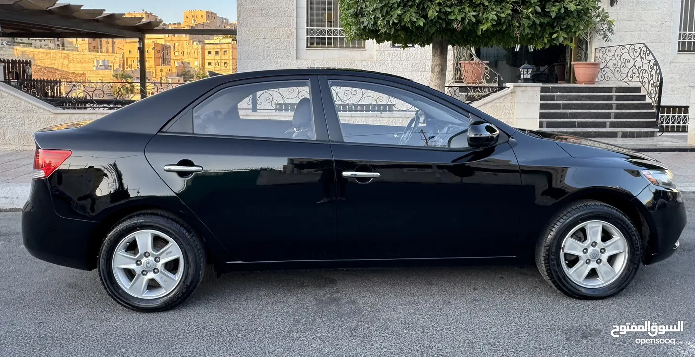 كيا فورتي للبيع بحالة ممتازه  Kia Forte 2013 لون اسود فحص كامل