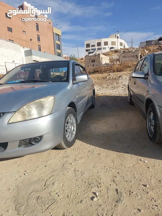 لانسر 2005 وارد الكويت 4 جيد ماتور 1600 الاصلي "الملا"