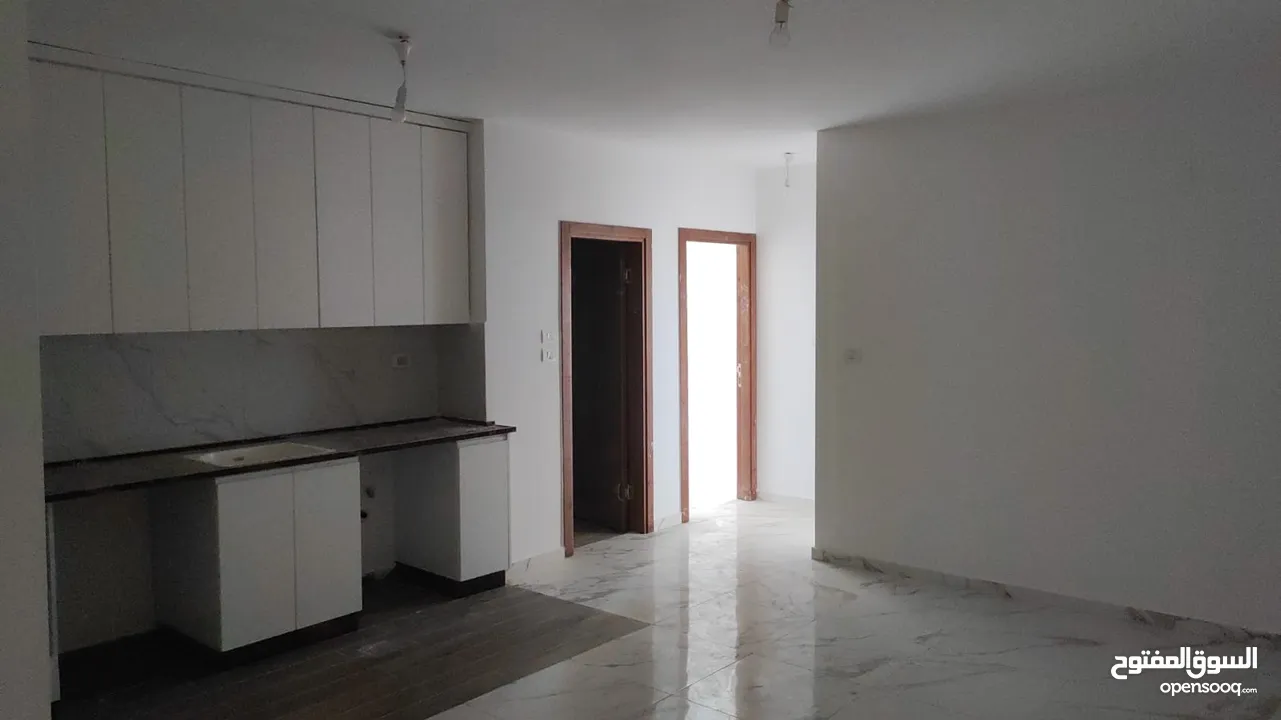 شقه مميزة جديدة غير مفروش للايجار عين مصباح قرب العفاف مول قريبه من وسط البلد