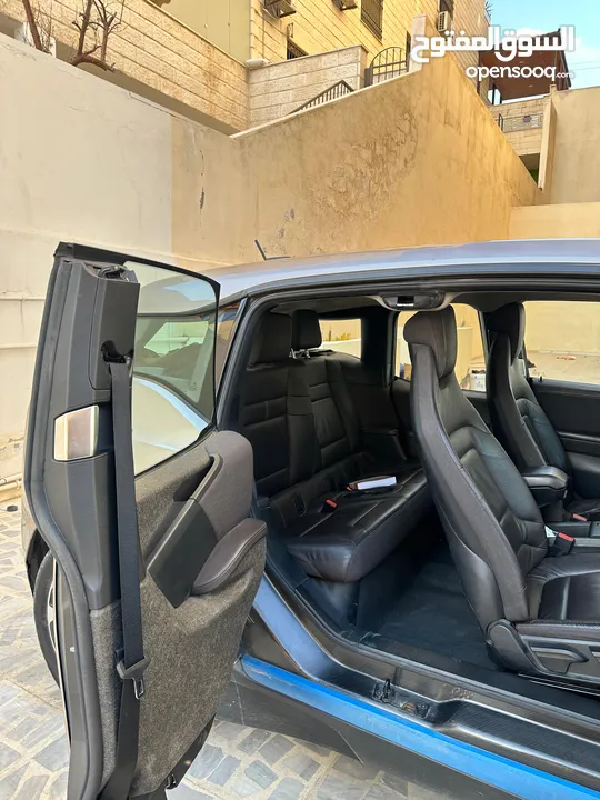 50 كم ماشيه دفعه 6500  قسط 200 بدون بنك BMW i3  شحن منزلي و كازيه نظام بنزين ريكس تيرا