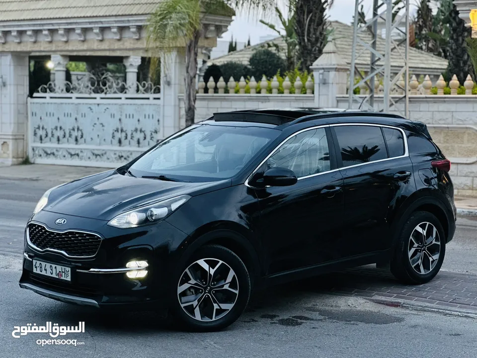 كيااا سبورتاج مطور 2000 بنزين 2*4 الجيب بالكراتين فل اضافات ملغم امكانية البيع نص بالنص الله يبارك