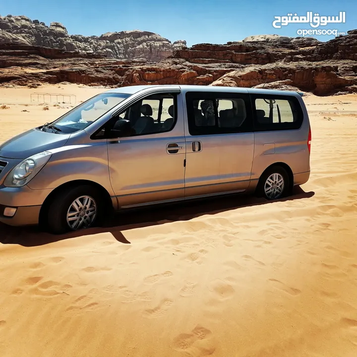 خدمة تأجير وتوصيل الى المطار والجسر باص سياحي