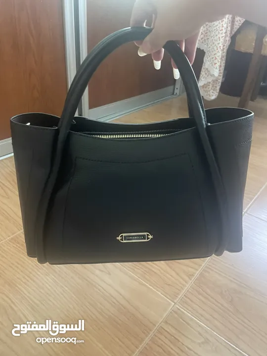 chris bella black leather purse for women. شنتة/شنطة/حقيبة كريس بيلا جلد اسود نسائية حجم كبير جديدة