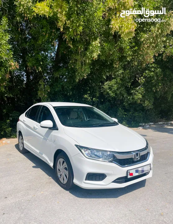 # HONDA CITY ( MODEL - 2019) WHITE COLOR SEDAN CAR 35 66 74 74