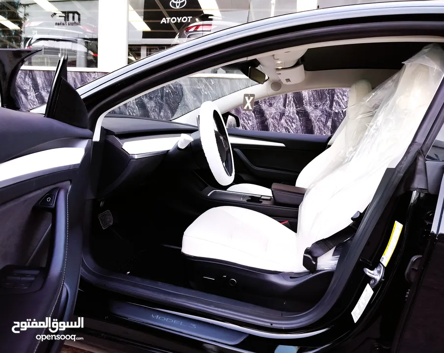 تيسلا 2023 model 3 فحص كامل اوتوسكور لون اسود ملوكي داخلي ابيض بحالة الوكالة بسعر لقطة ومحروووق