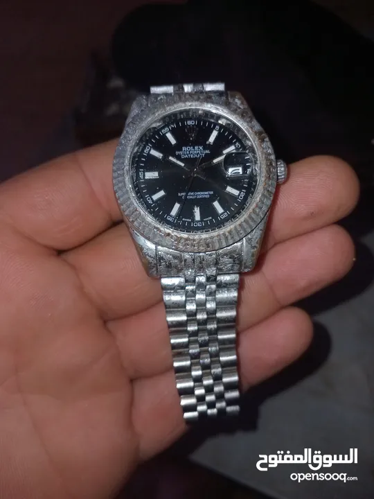 ساعة رولكس مع ساعة اخرى كما هو بااصور للبيع