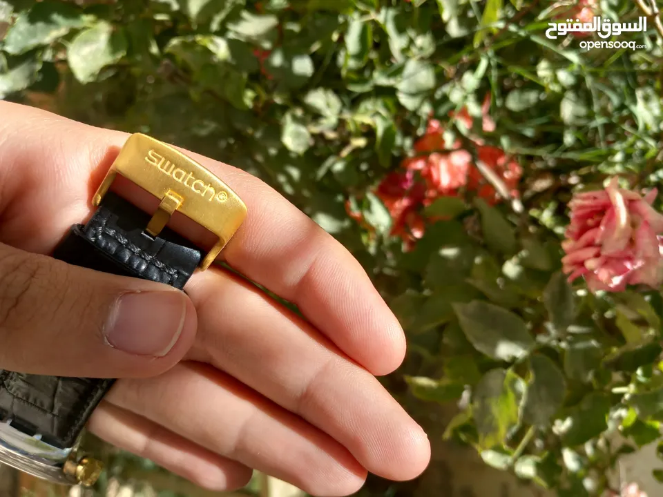 Swatch Irony Gold and Black  بسعر مميز جدا شبه وكالة