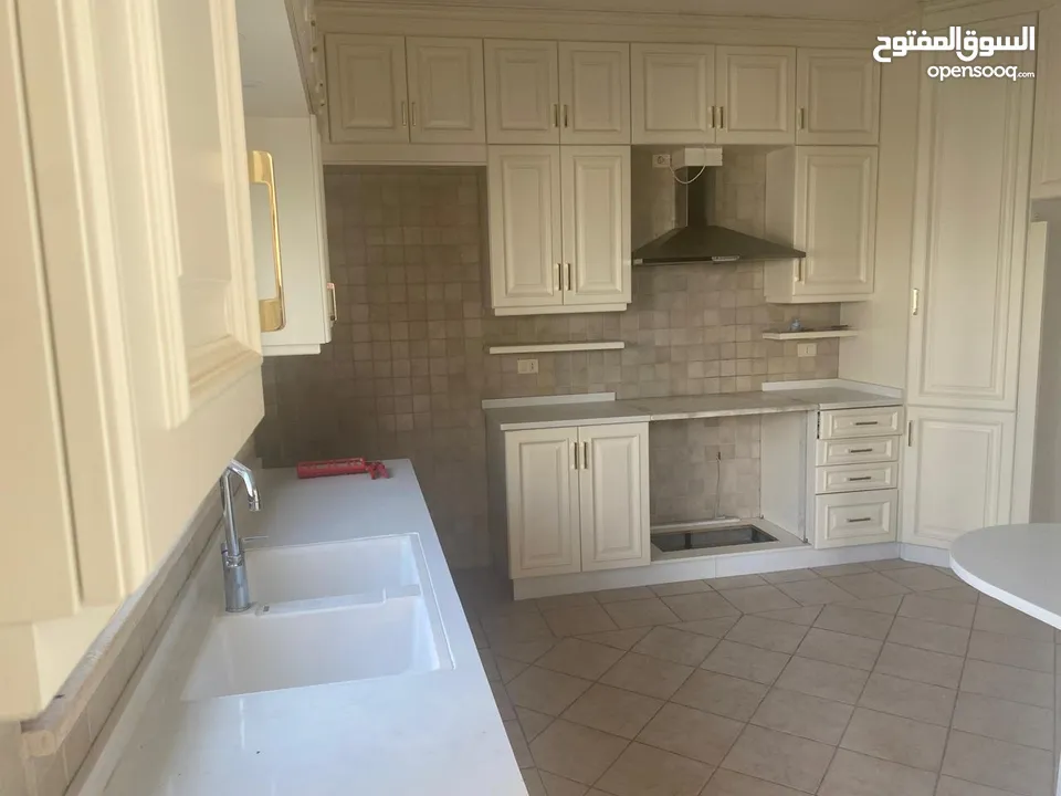 شقه فارغه ارضيه للايجار في دير غبار - REF : 14534