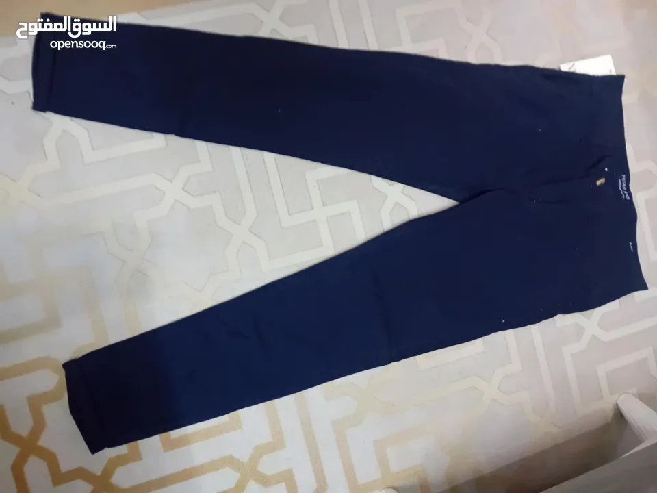 شروات ملابس رجالي بنطلون جينز وكتان وقميص وشرت البضاعه جديد البضاعه صنع تركي وصيني العدد 610