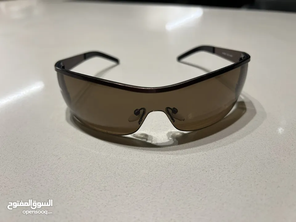 نظارة شمسية Police S8185N Bronze الأصلية – تصميم أنيق وجودة عالية