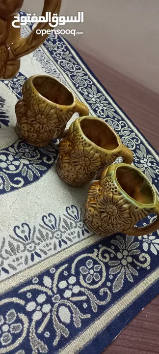 طقم ابريق و6 كاسات فخار انتيك