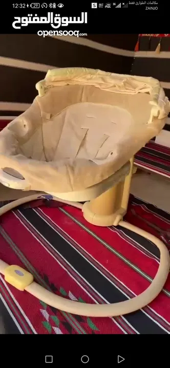 كرسي بيبي هزاز على الكهرباء