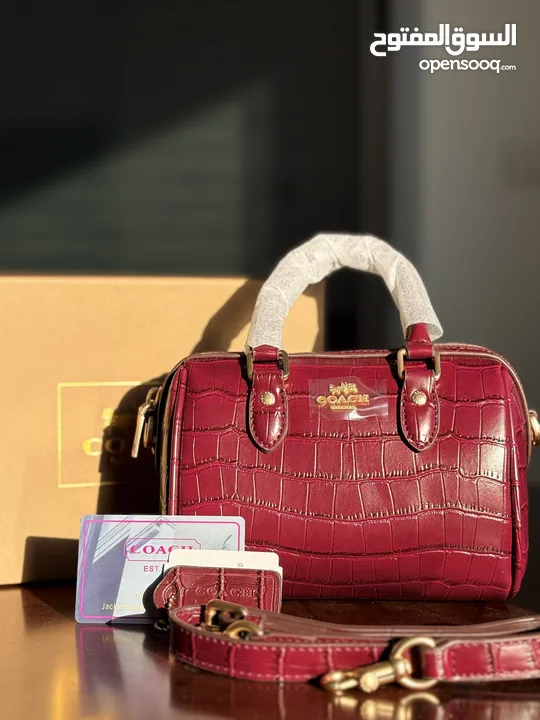 شنطة كوتش برغندي لميع 18 سم