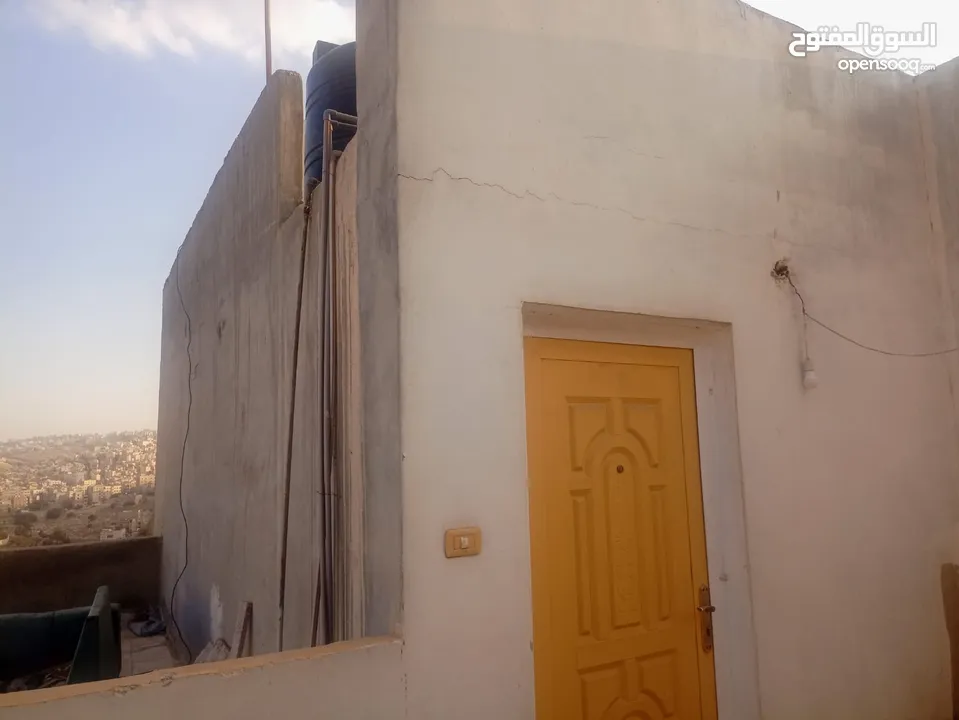 عمارة سكنية في الهاشمي الشمالي