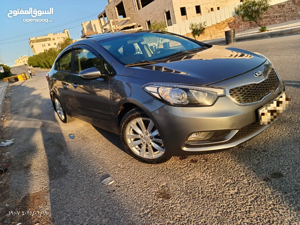 كيا سراتو موديل 2016 لون فيراني فحص كامل ترخيص سنة كاملة وتأمين ضد الغير